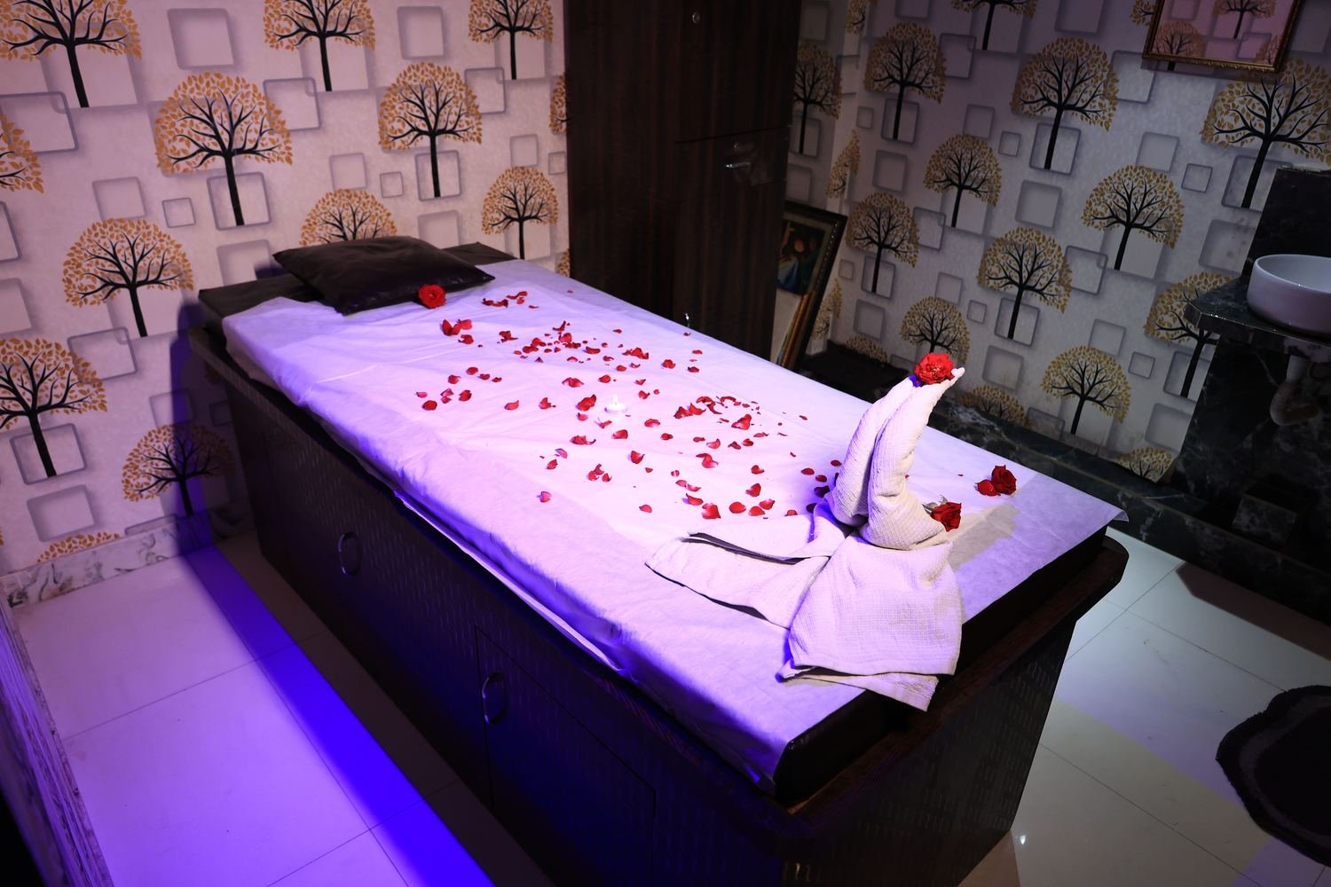 Private massage room prepared with fresh linen at Paradise Spa, Mira Road